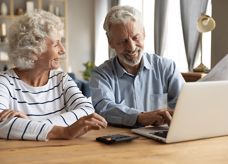 Senior couple managing finances on laptop for conservatorship law banner